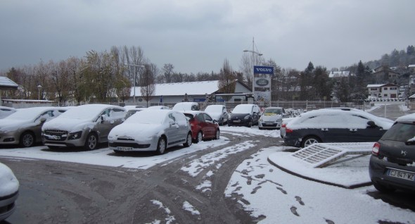 Car Dealership covered in Snow