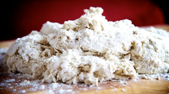 Sticky dough on floured surface ready for some serious kneading. Serious because it doesn't quite come together and stays very sticky.