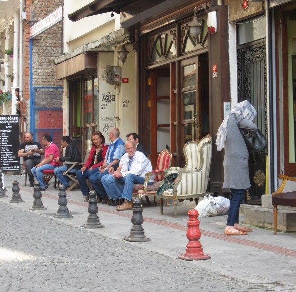 Locals come out to enjoy the evening light and catch up (whilst using the local antique chairs)